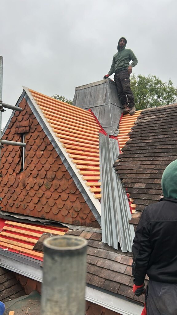 Removing Roof Tiles on Redland Property (1)